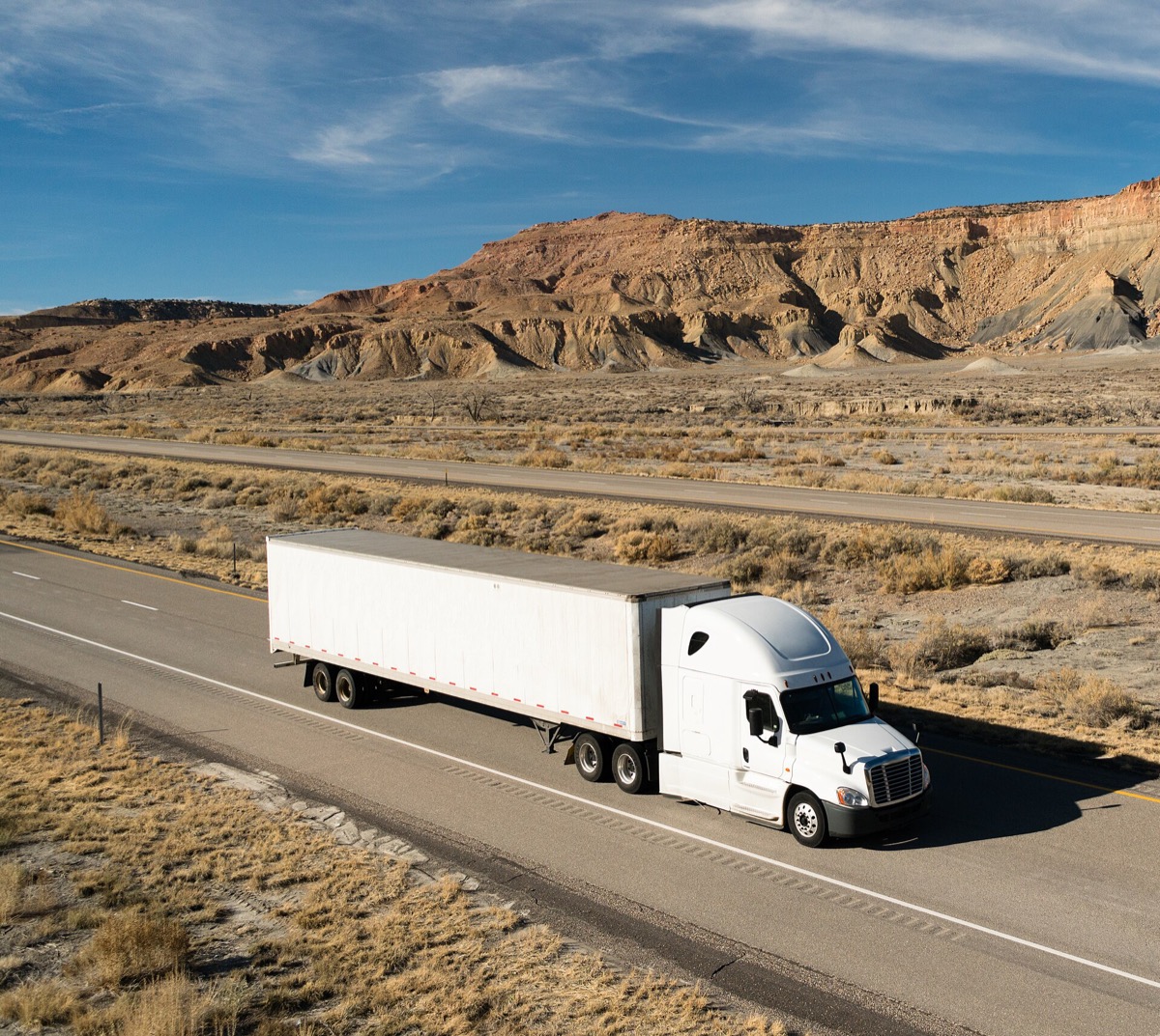 Full truckload dry van semi on the open highway